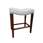 white leather saddle stool