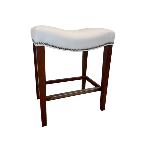 white leather saddle stool