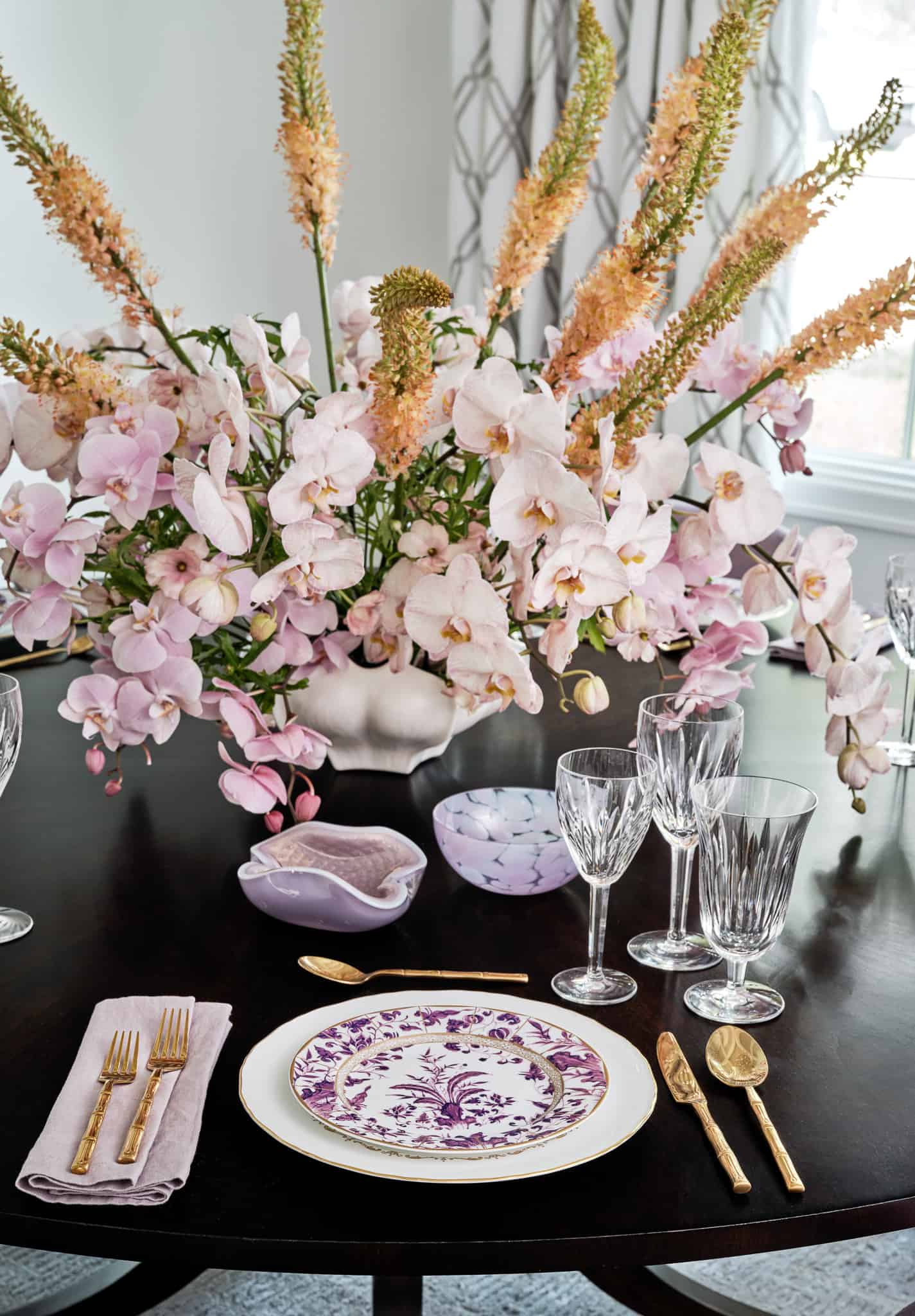 table setting flowers and glassware